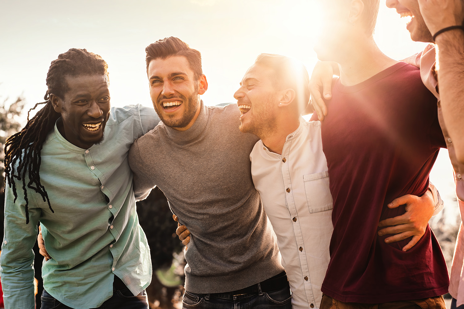 Friends laughing together outdoors